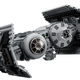 A photo shows the new Lego TIE Bomber as it flies across a white background.